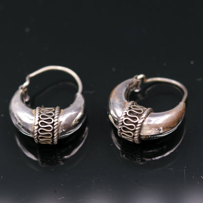 Traditional tribal-style sterling silver hoops earrings, handmade vintage ethnic jewelry with intricate tribal design and kundal accents.