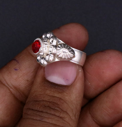 Traditional handmade red stone jadau ring band for women, featuring intricate tribal jewelry design from Rajasthan, India.