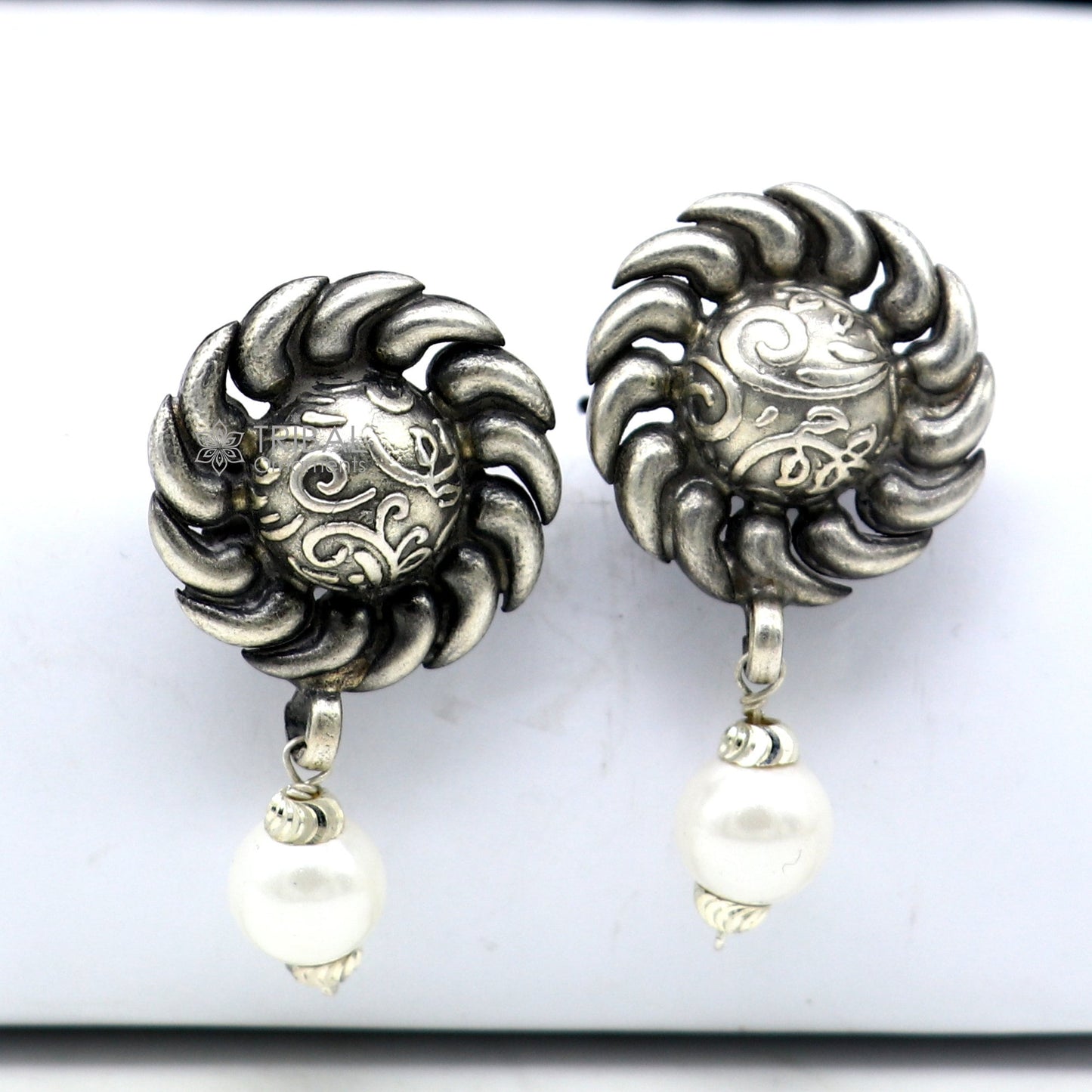 Tribal Ornaments handmade sterling silver stud earrings with round flower design and pearl accents, ethnic tribal jewelry.