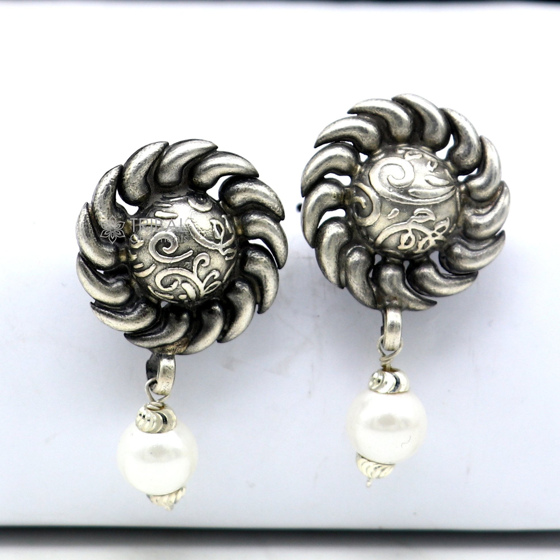 Tribal Ornaments handmade sterling silver stud earrings with round flower design and pearl accents, ethnic tribal jewelry.