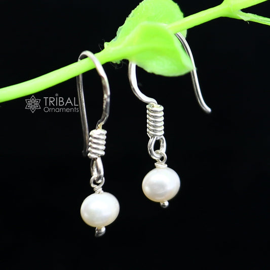 Sterling silver hoop earrings with gorgeous pearl stones, lightweight and stylish, delicate jewelry by TRIBAL ORNAMENTS.