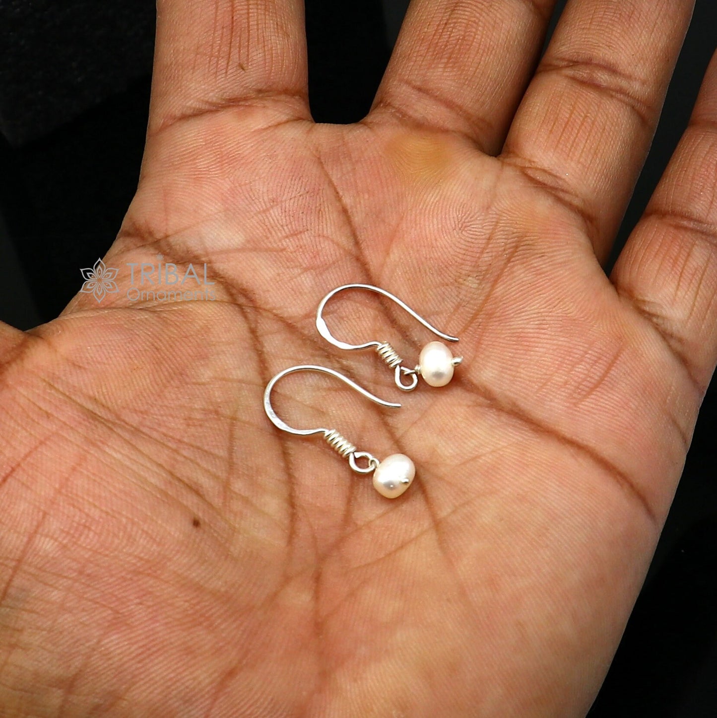 Sterling silver hoop earrings by TRIBAL ORNAMENTS with elegant pearl stones, lightweight and stylish delicate jewelry.