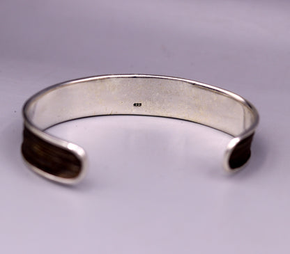 Vintage-style 925 sterling silver "Aum Namah Shivay" mantra bangle cuff bracelet with adjustable fit, unisex design, tribal ornament jewelry.
