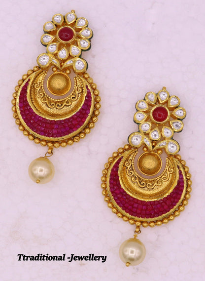 Handmade vintage 22KT yellow gold Kundan stone Jadau earrings by TRIBAL ORNAMENTS, showcasing intricate antique jewelry design.