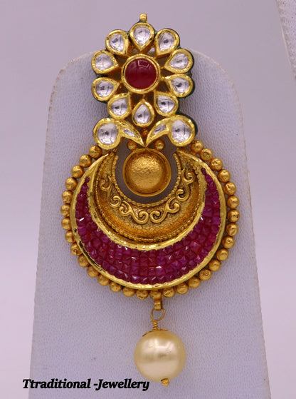 Vintage handmade 22K yellow gold Kundan and Jadau earrings featuring intricate antique design and vibrant gemstones.