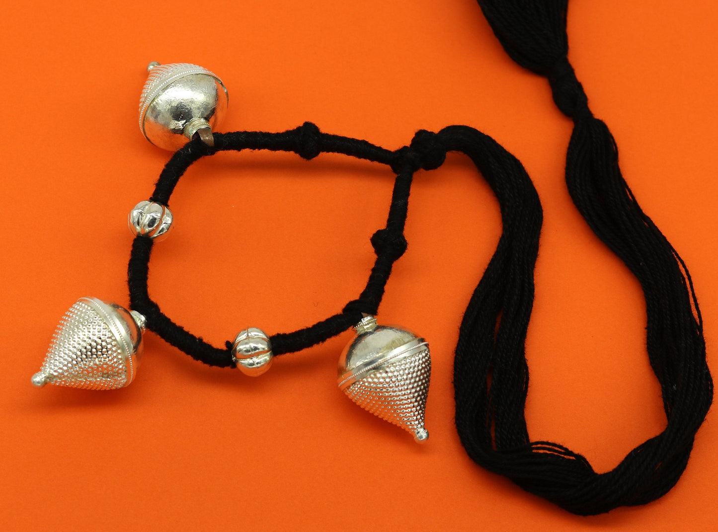 Vintage tribal charm necklace in sterling silver with intricate hand-crafted ethnic design, perfect for bridesmaids.