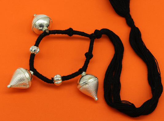 Vintage tribal charm necklace in sterling silver with intricate hand-crafted ethnic design, perfect for bridesmaids.
