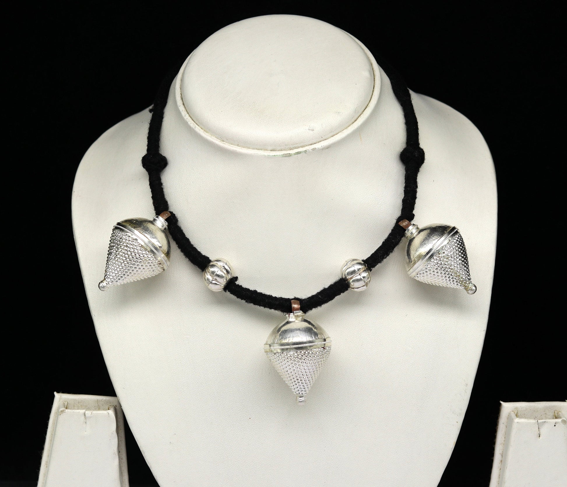Vintage sterling silver tribal charm necklace with intricate handcrafted design, perfect for ethnic bridesmaids and special occasions.