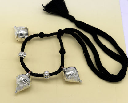Vintage antique sterling silver tribal charm necklace with intricate ethnic design, handcrafted by TRIBAL ORNAMENTS.