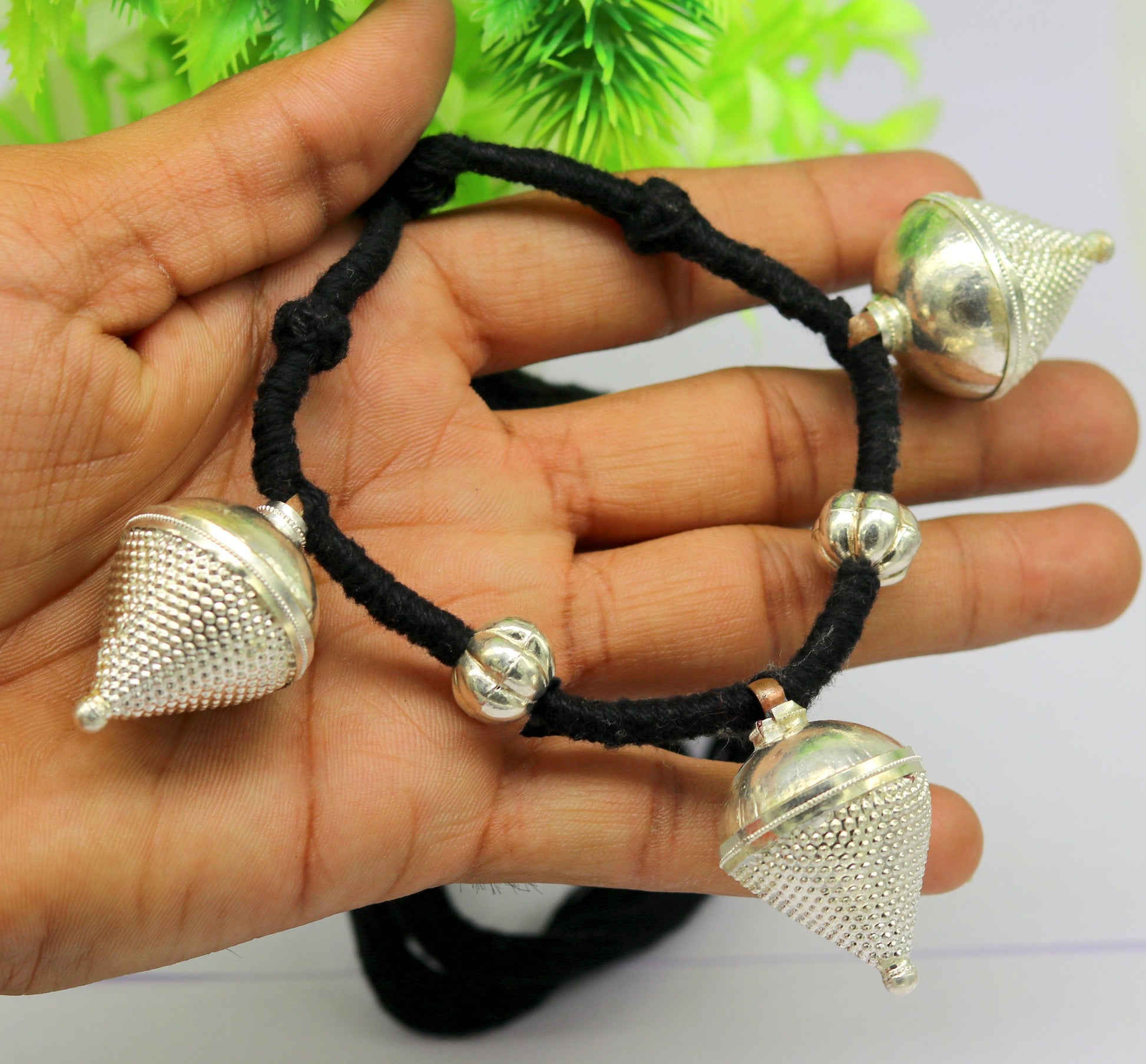 Vintage antique sterling silver tribal charm necklace with detailed ethnic design, handcrafted for ethnic bridesmaids.