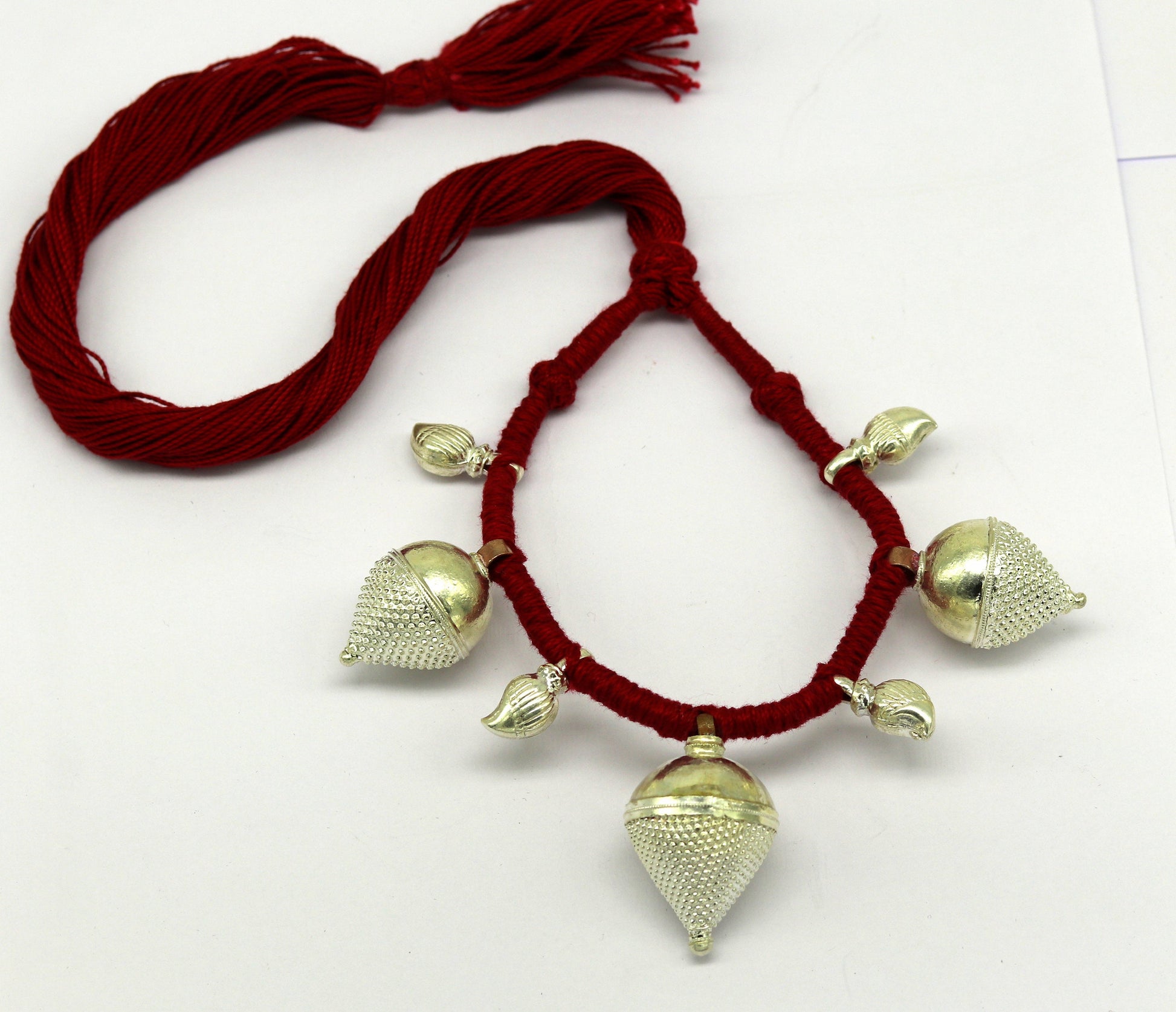 Vintage sterling silver tribal charm necklace by TRIBAL ORNAMENTS with intricate handmade ethnic design, perfect for bridesmaids.