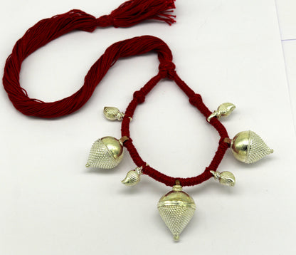 Vintage sterling silver tribal charm necklace by TRIBAL ORNAMENTS with intricate handmade ethnic design, perfect for bridesmaids.