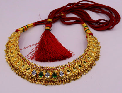 Vintage handmade tribal Tussi pattern necklace with hanging bells, perfect for wedding or party jewelry by Tribal Ornaments.