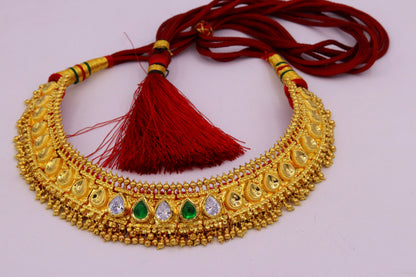 Vintage tribal necklace by TRIBAL ORNAMENTS featuring handmade Tussi pattern, hanging bells, perfect for wedding or party jewelry.