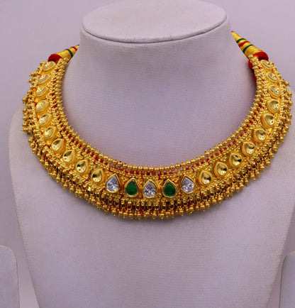 Vintage tribal necklace by TRIBAL ORNAMENTS featuring handmade Tussi pattern and hanging bells, ideal for wedding or party jewelry.