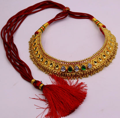 Vintage tribal necklace by TRIBAL ORNAMENTS featuring handmade Tussi pattern and hanging bells, perfect for wedding or party jewelry.
