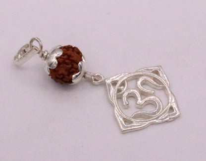 Vintage solid silver Aum pendant with natural Rudraksh beads, handmade tribal jewelry.