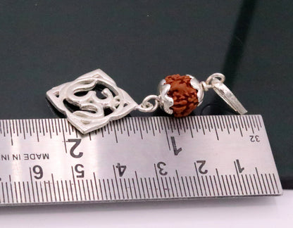 Vintage solid silver Aum pendant with natural Rudraksh beads, handmade tribal jewelry, traditional design by TRIBAL ORNAMENTS.