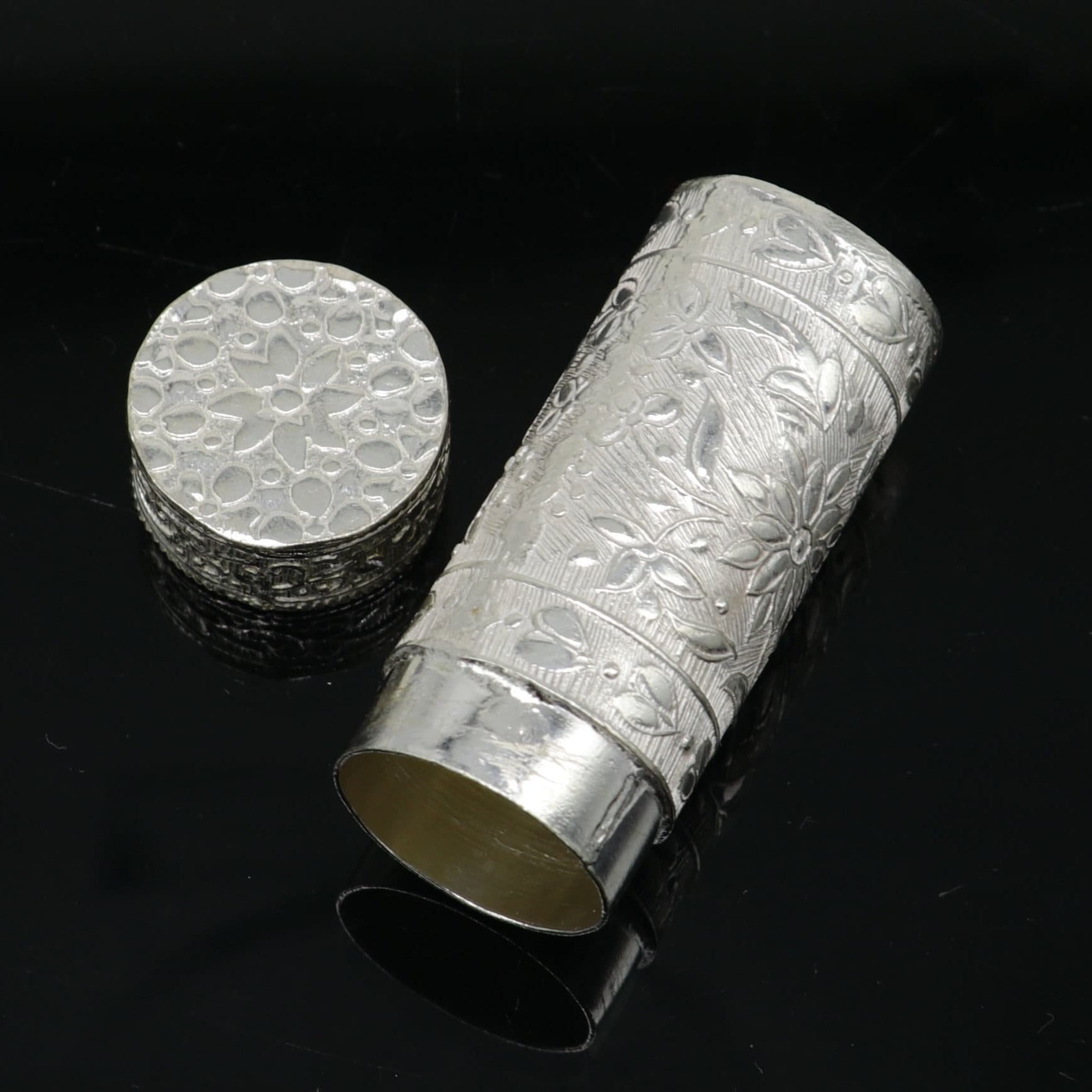Vintage silver handmade trinket box by Tribal Ornaments, antique design eye kajal container, ideal for brides’ gifts.