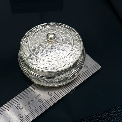 Solid silver vintage handmade trinket box with antique design, used for prasad, kumkum, and sindur storage, by Tribal Ornaments.