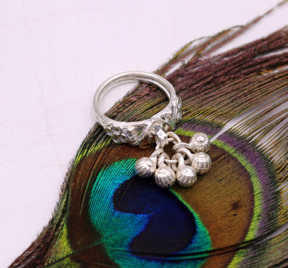 Sterling silver vintage charm ring with noisy bells, handmade belly dance jewelry featuring antique design from TRIBAL ORNAMENTS.