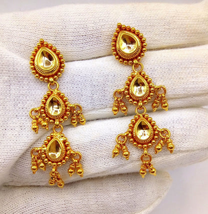 Vintage 22k yellow gold handmade Tussi earrings, tribal jewelry from Rajasthan India, showcasing traditional Indian tribal design.