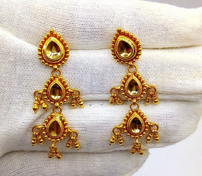 Vintage 22K yellow gold handmade Tussi earrings, tribal jewelry from Rajasthan, India, featuring intricate traditional design.