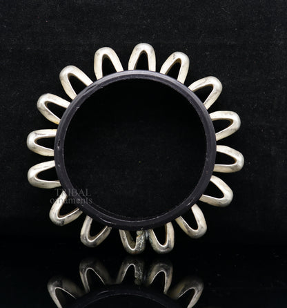 Vintage silver bangle bracelet with intricate tribal design from Banjara jewelry by TRIBAL ORNAMENTS.