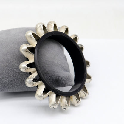 Vintage silver tribal bangle from TRIBAL ORNAMENTS, featuring intricate handmade ethnic Banjara jewelry design.