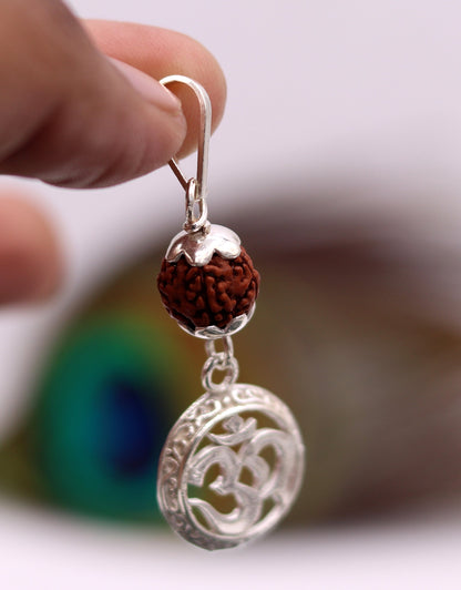 Vintage solid silver Aum pendant with natural Rudraksh beads, handmade tribal jewelry by TRIBAL ORNAMENTS.