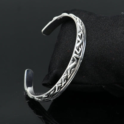 Vintage style 925 sterling silver adjustable cuff bracelet by Tribal Ornaments, unisex handmade jewelry with intricate design.