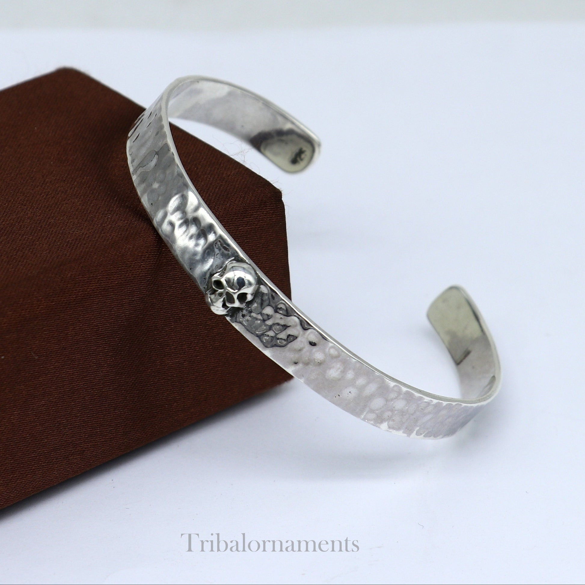 Vintage style 925 sterling silver adjustable cuff bangle bracelet by Tribal Ornaments, featuring a solid skull design.
