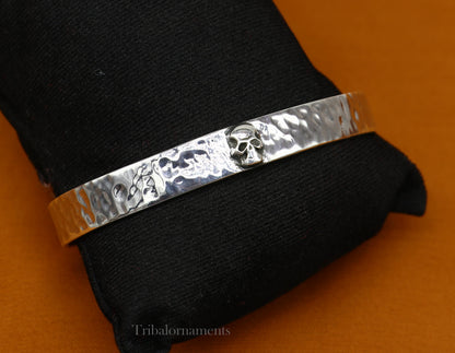 Vintage style 925 sterling silver adjustable cuff bangle bracelet by Tribal Ornaments, featuring a solid skull design.