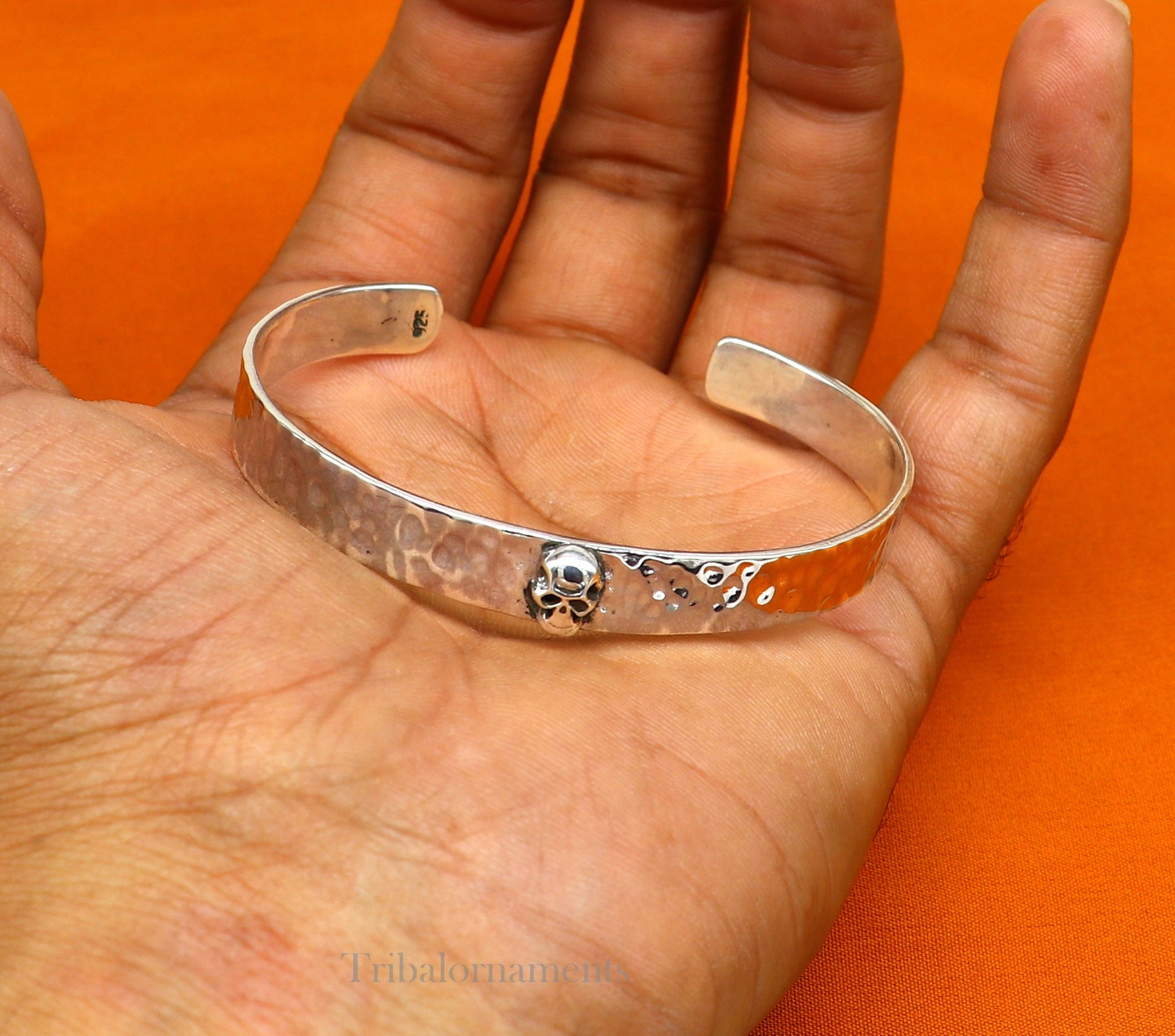 Vintage 925 sterling silver adjustable cuff bangle bracelet by TRIBAL ORNAMENTS, featuring a solid skull design, unisex jewelry.