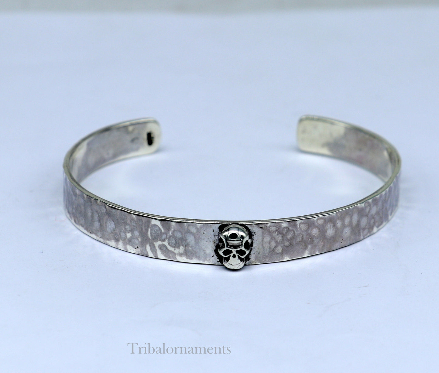 Vintage-style 925 sterling silver adjustable cuff bangle bracelet by Tribal Ornaments, featuring a solid skull design for unisex gifting.