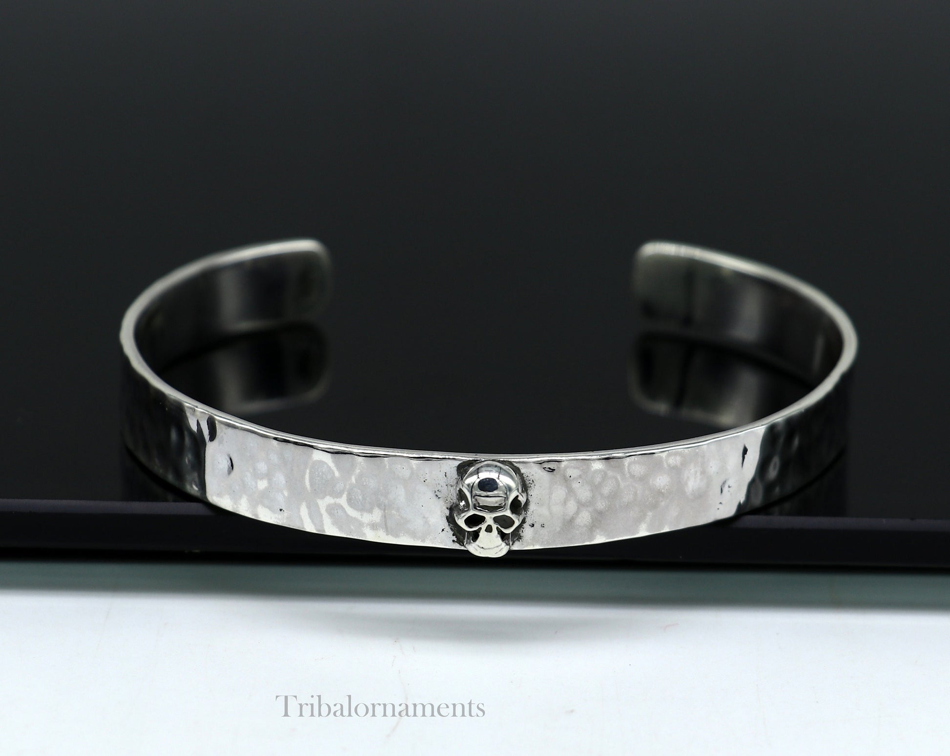 Vintage-style 925 sterling silver adjustable cuff bracelet by Tribal Ornaments, featuring a solid skull design, unisex jewelry.