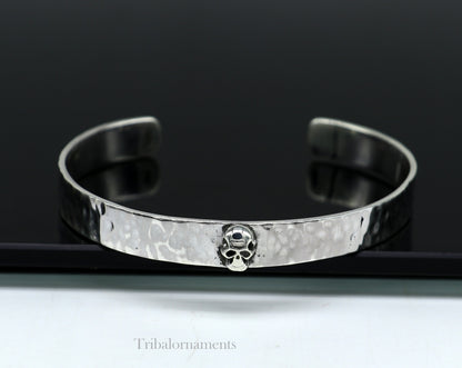 Vintage-style 925 sterling silver adjustable cuff bracelet by Tribal Ornaments, featuring a solid skull design, unisex jewelry.