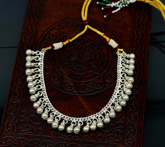 Vintage silver noisy bell necklace with adjustable back threads, featuring charm bells ideal for belly dance jewelry by TRIBAL ORNAMENTS.