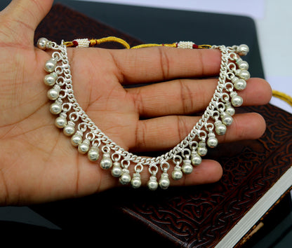 Vintage silver noisy bells necklace with adjustable back threads, tribal charm design, perfect for belly dance jewelry.
