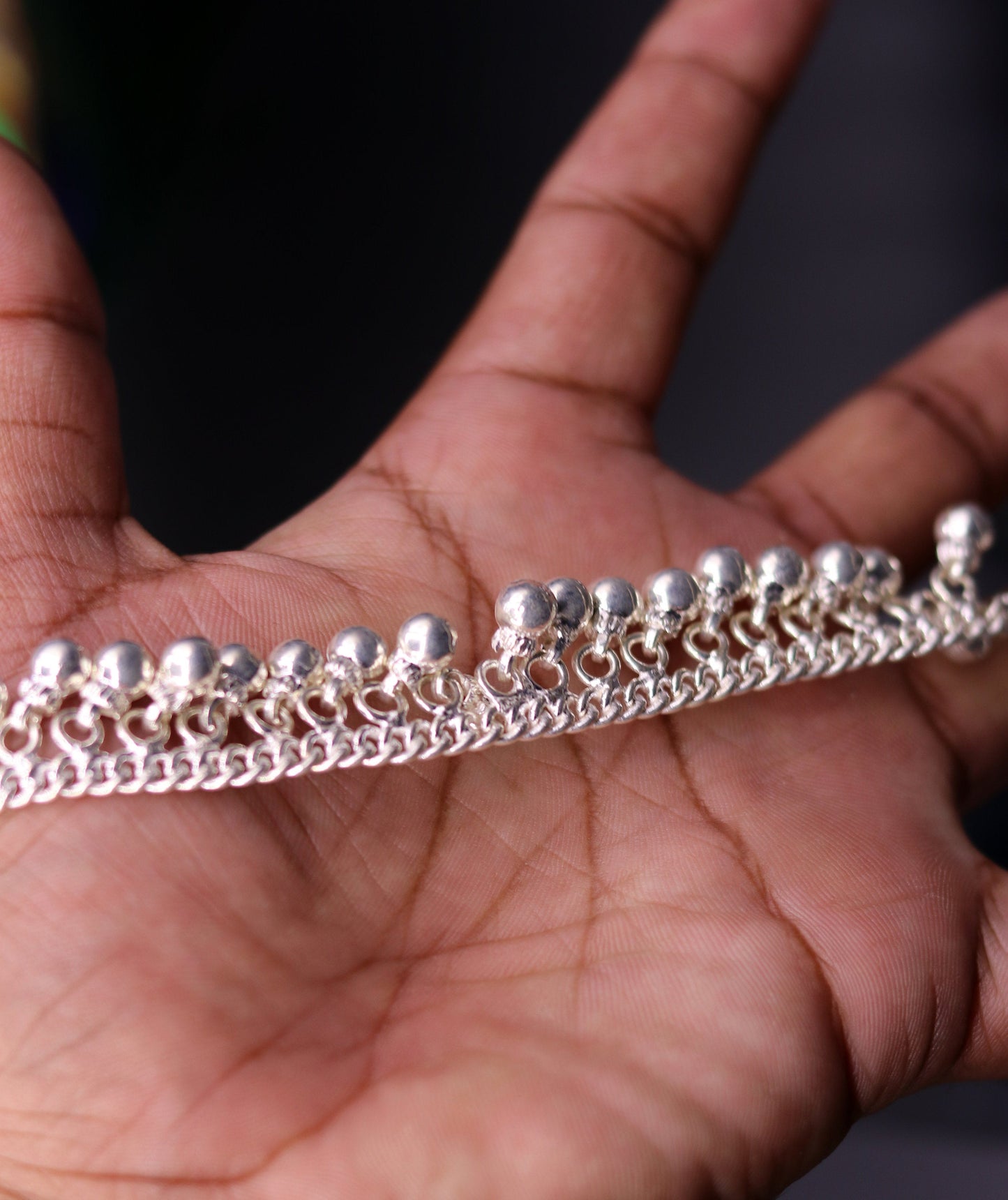 Vintage sterling silver ankle bracelet with handmade chain and noisy jingle bells, featuring tribal design and genuine jewelry craftsmanship.
