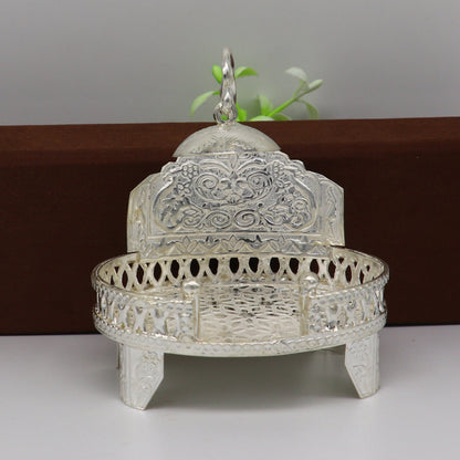 Vintage sterling silver Sinhasan throne for Krishna Bal Gopala idol, temple art stand, detailed traditional design, religious puja accessory.