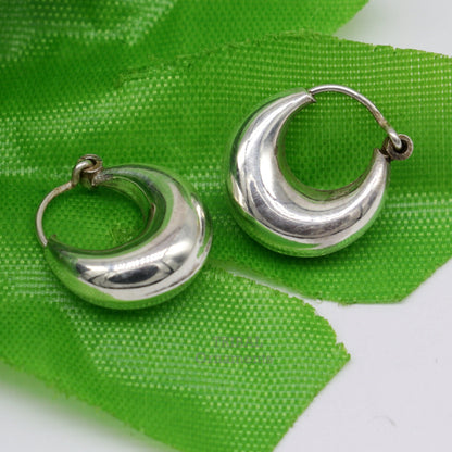 Vintage tribal sterling silver hoops earrings from Rajasthan India, featuring intricate design and unisex jewelry style.