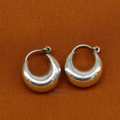 Vintage tribal sterling silver hoops earrings from Rajasthan India, featuring intricate tribal kundal design for unisex jewelry.