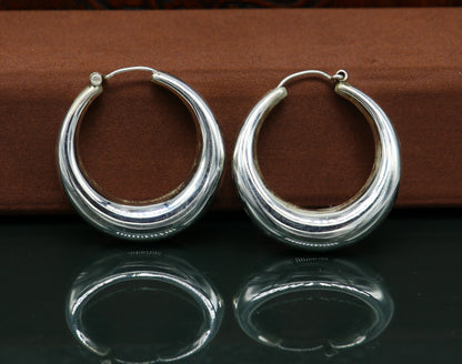 Vintage tribal sterling silver hoops earring from Rajasthan India, featuring intricate design, unisex jewelry by TRIBAL ORNAMENTS.