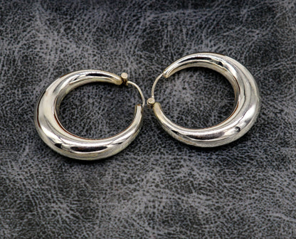 Vintage tribal sterling silver hoop earrings from Rajasthan India, featuring intricate designs, unisex jewelry by Tribal Ornaments.