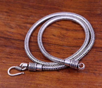 Vintage tribal silver necklace with 18-inch oxidized 925 sterling silver snake chain and pendant, handcrafted tribal jewelry piece.