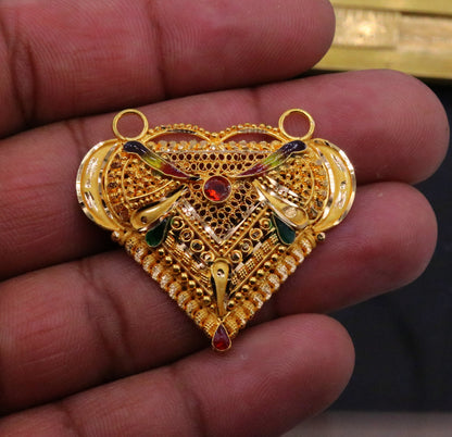 Vintage 22KT yellow gold filigree Meenakari pendant featuring traditional Indian tribal jewelry craftsmanship.