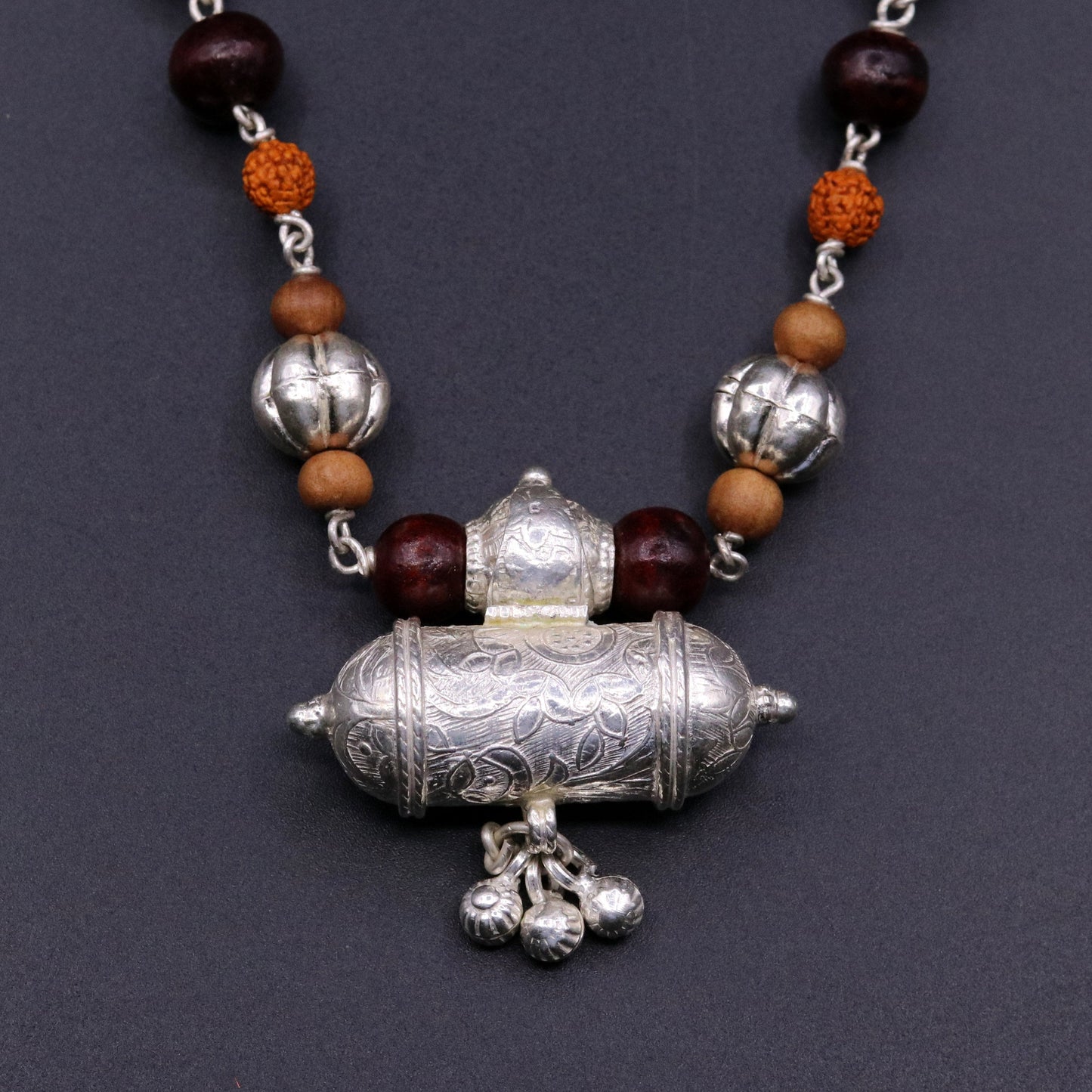 Vintage tribal silver necklace set with sandalwood, Rudraksha beads, amulet pendant, and hanging bells jewelry by TRIBAL ORNAMENTS