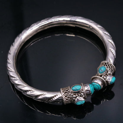 Vintage sterling silver turquoise jadau bangle bracelet with intricate tribal design and unisex style from Tribal Ornaments.