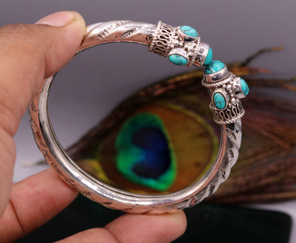 Vintage 925 sterling silver turquoise stone jadau bangle bracelet from Tribal Ornaments, unisex handmade jewelry with intricate design.